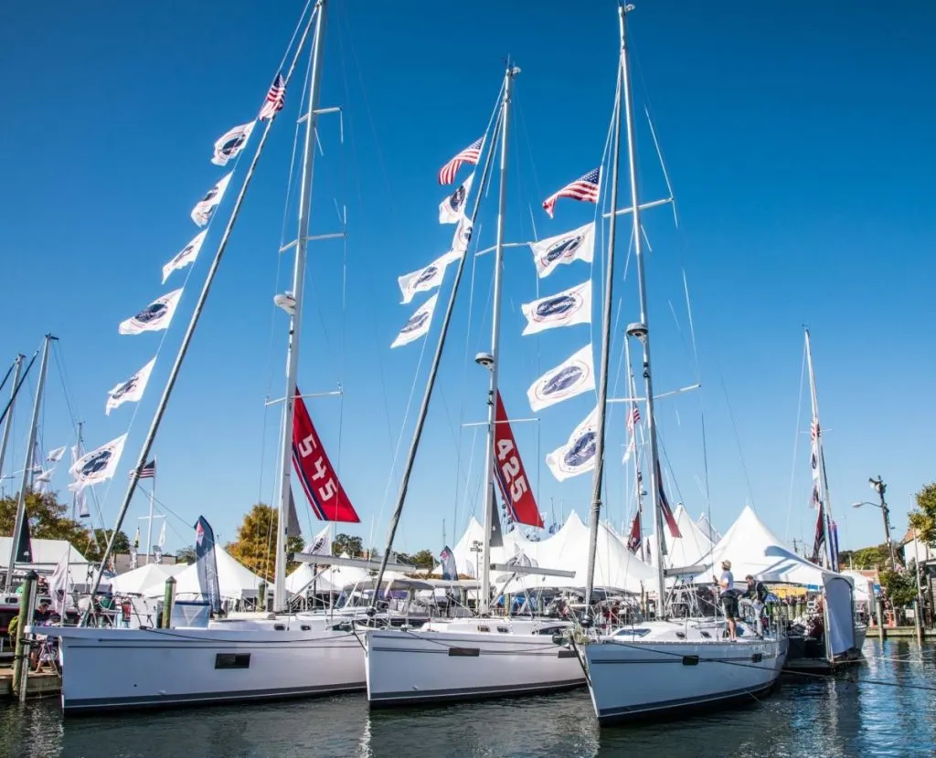 A Massey broker on the dock alongside a client's yacht